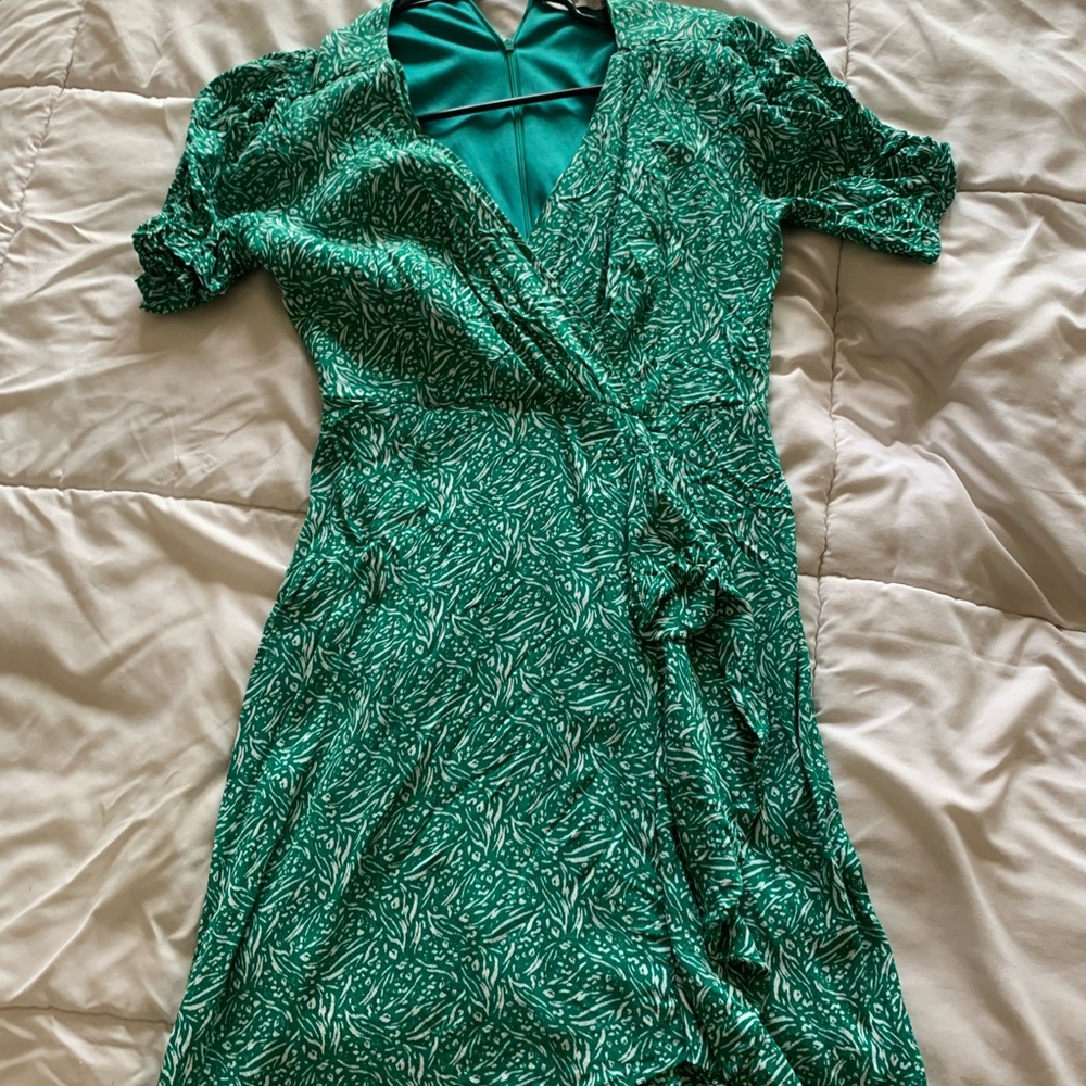 Green dress with white pattern